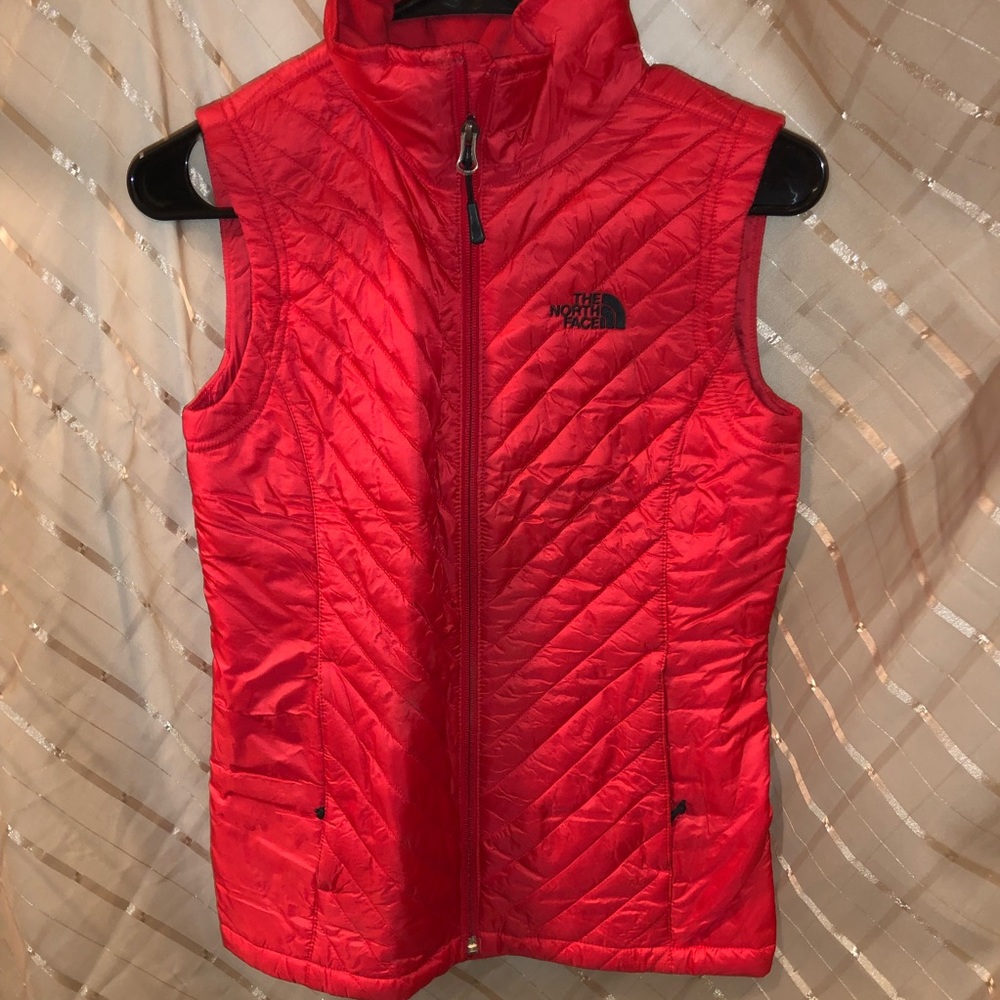 Red north face vest